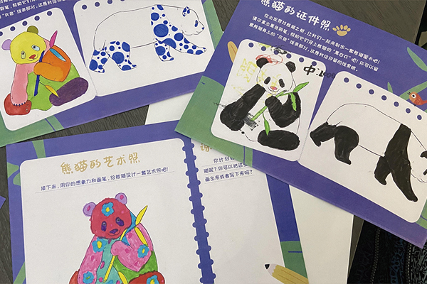 圖四：小朋友們?cè)谧匀徽n堂上進(jìn)行熊貓「藝術(shù)照」創(chuàng)作